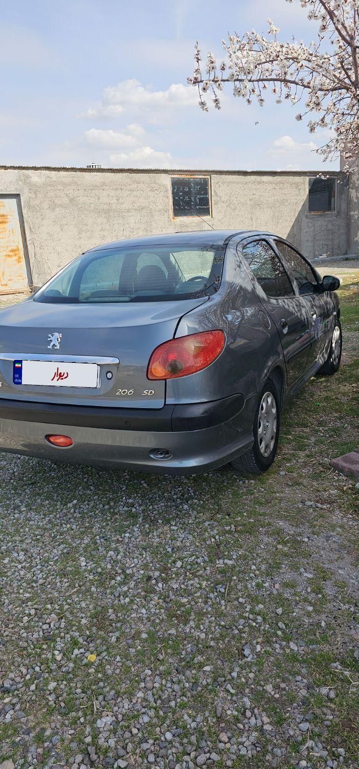 پژو ۲۰۶ صندوق دار v8 - 1393