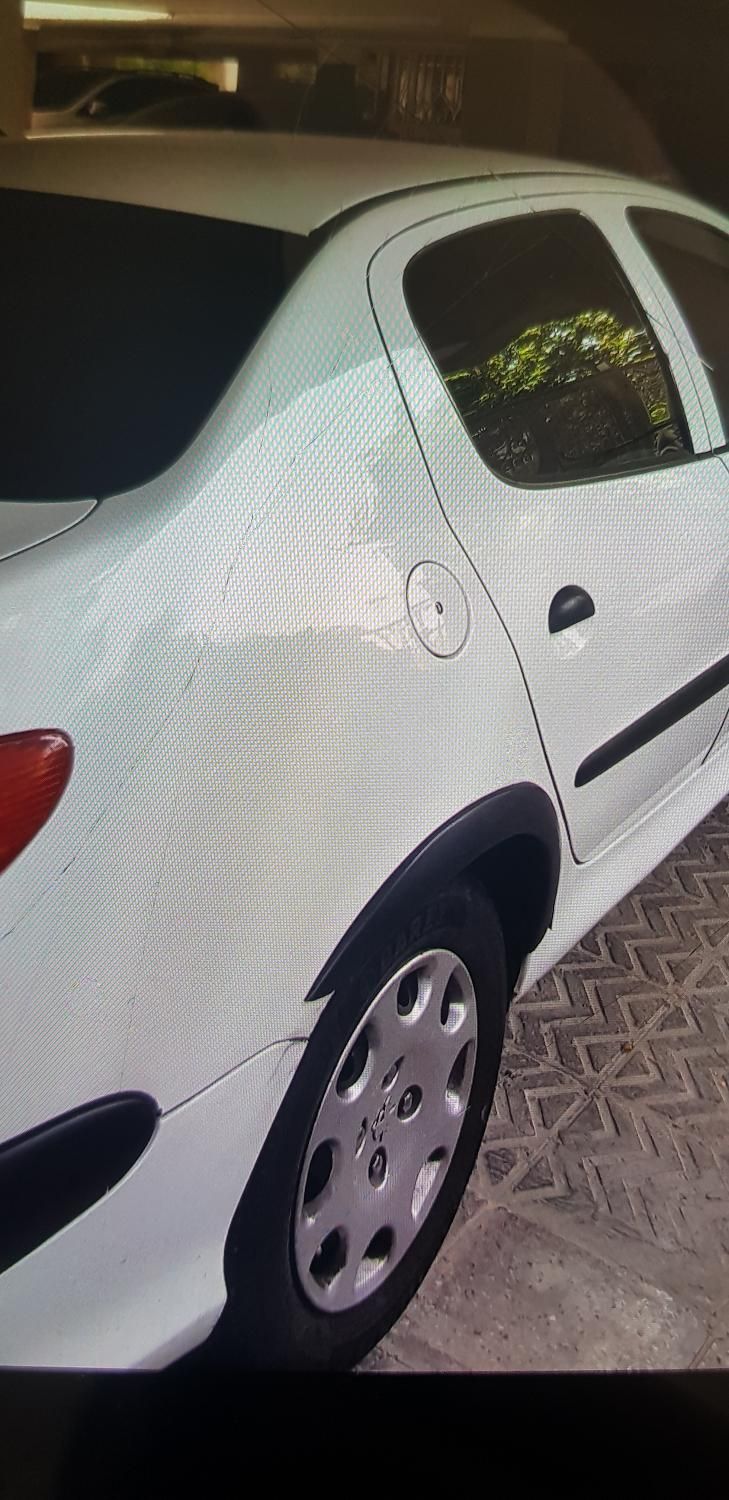 پژو ۲۰۶ صندوق دار v8 - 1395