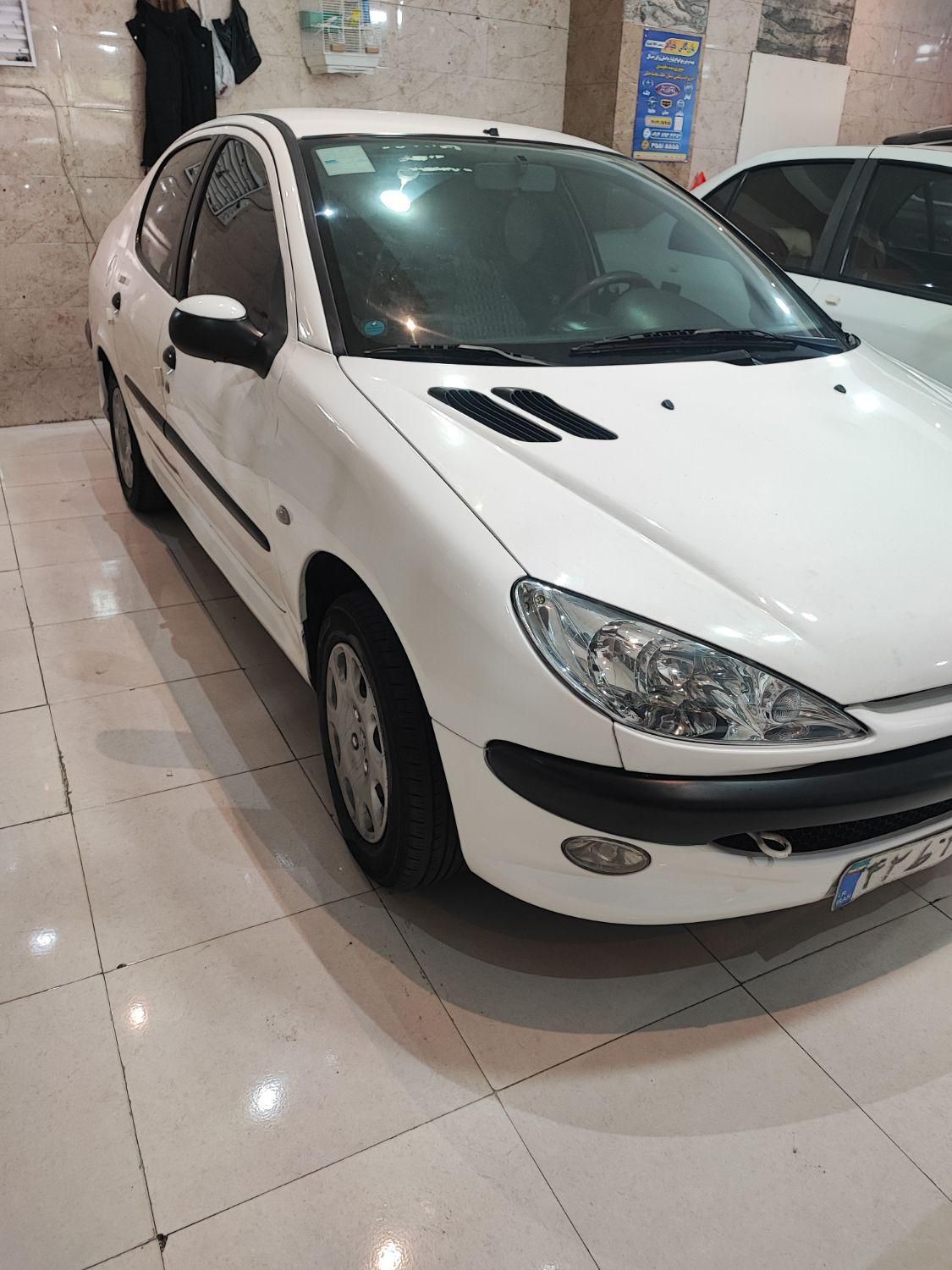 پژو ۲۰۶ صندوق دار v8 - 1396