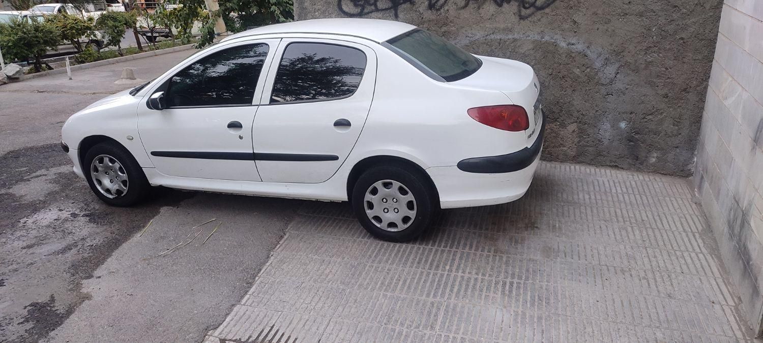 پژو ۲۰۶ صندوق دار v8 - 1394