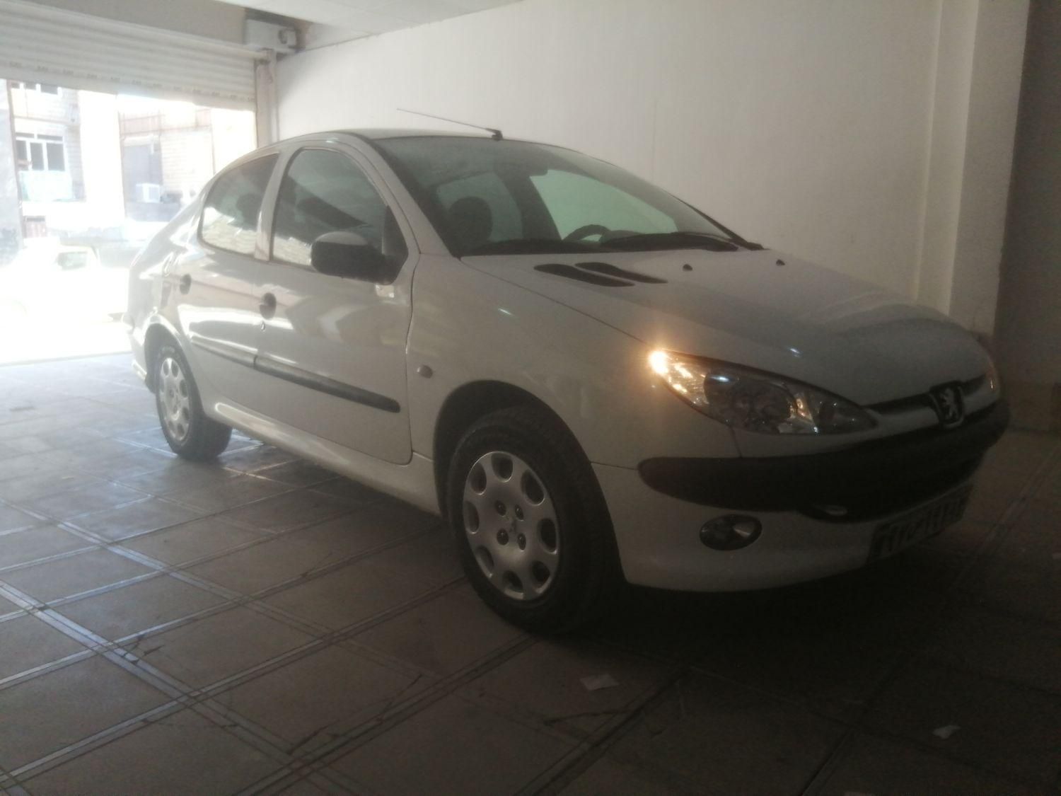 پژو ۲۰۶ صندوق دار v8 - 1394