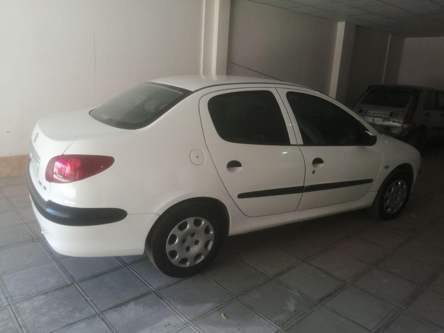 پژو ۲۰۶ صندوق دار v8 - 1394