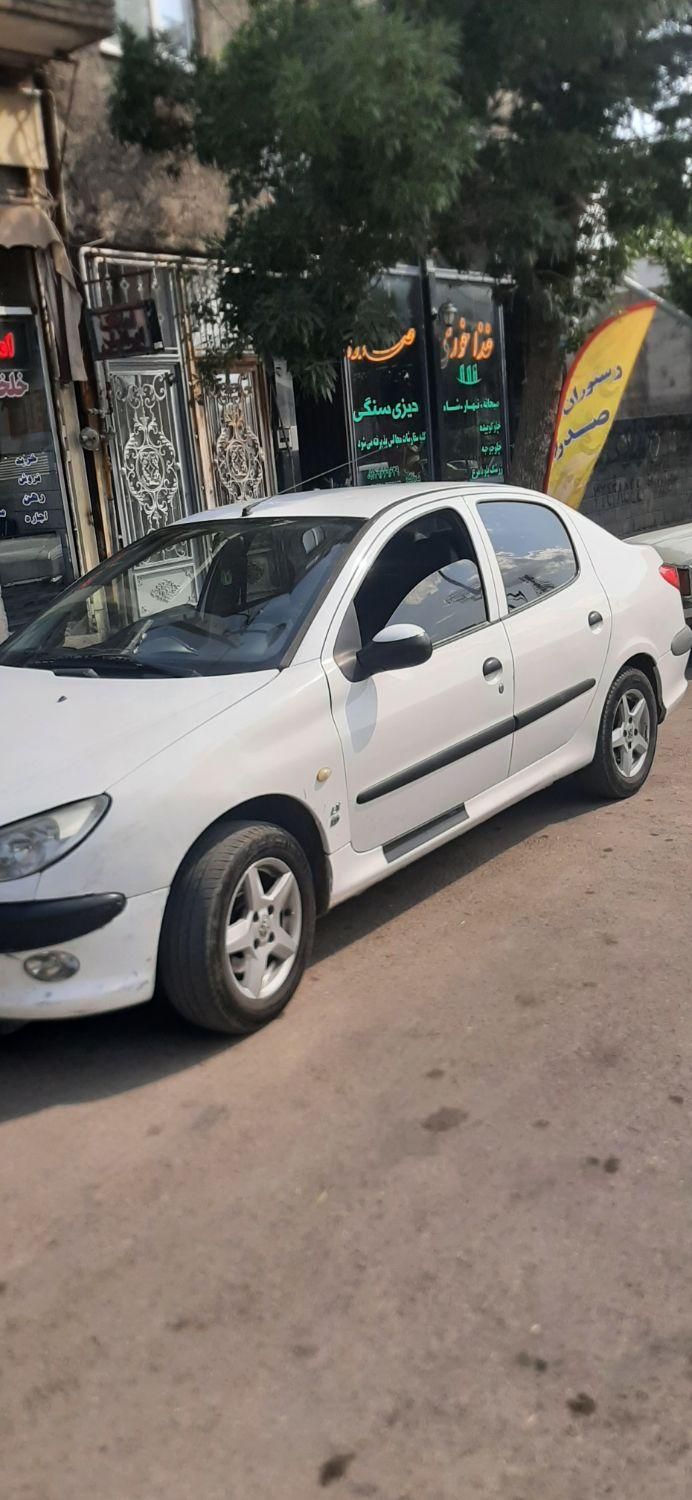 پژو ۲۰۶ صندوق دار v8 - 1394