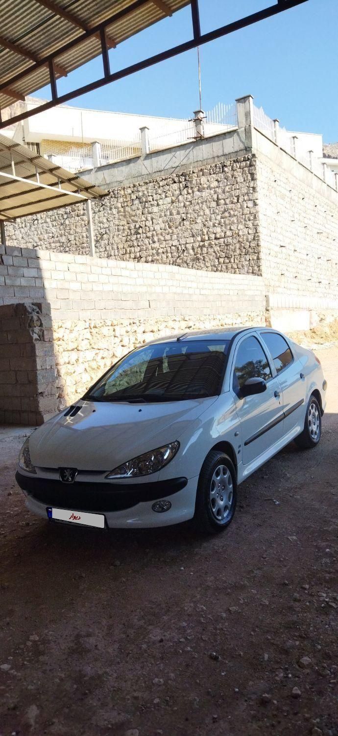 پژو ۲۰۶ صندوق دار v8 - 1394
