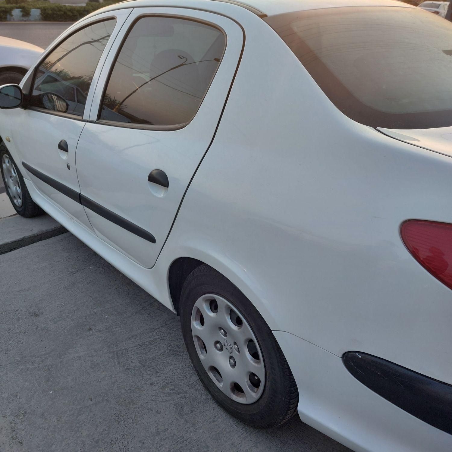 پژو ۲۰۶ صندوق دار v8 - 1396