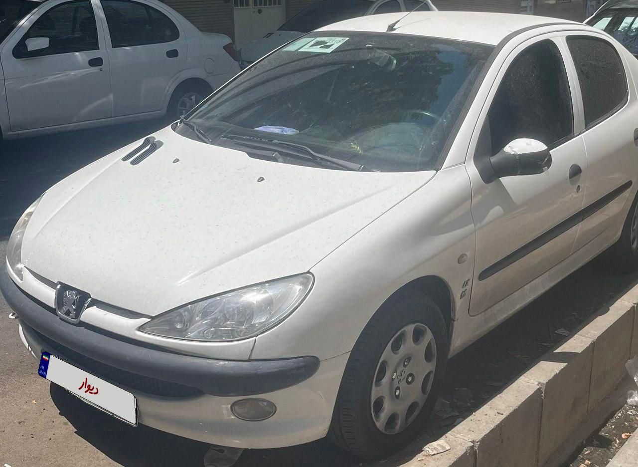 پژو ۲۰۶ صندوق دار v8 - 1394
