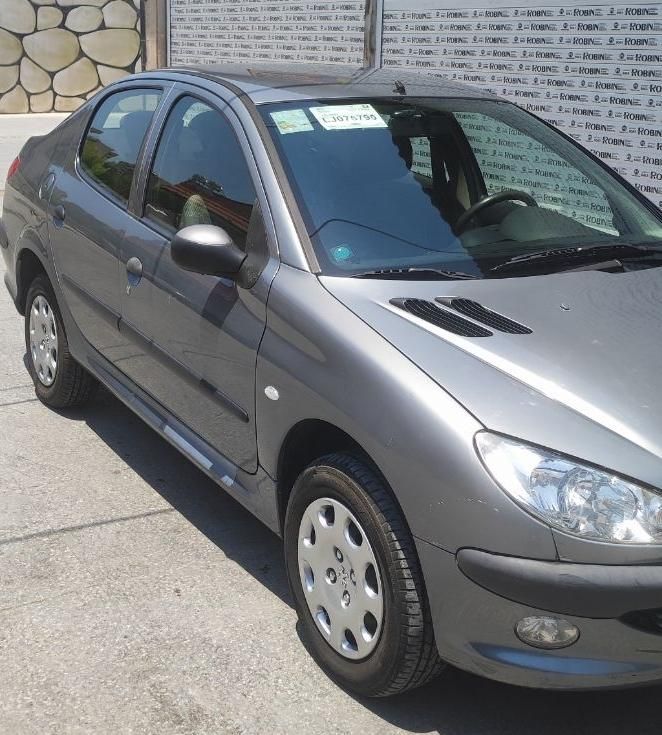 پژو ۲۰۶ صندوق دار v8 - 1399