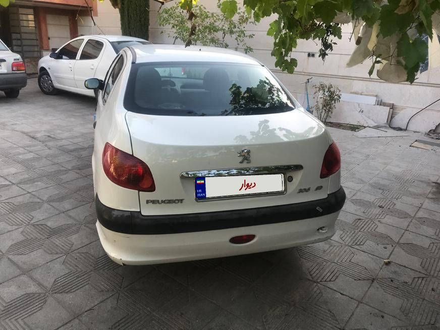پژو ۲۰۶ صندوق دار v8 - 1395