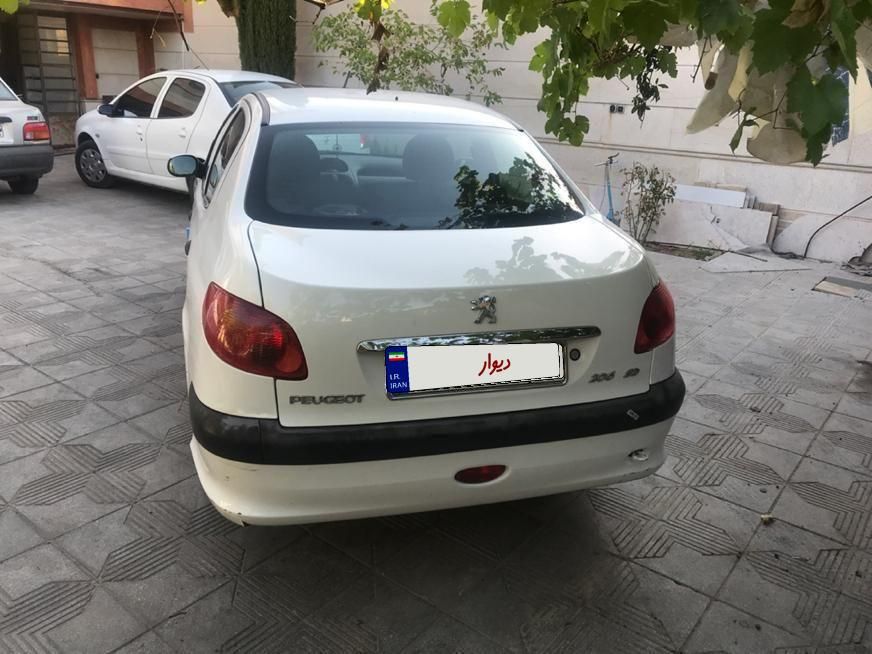 پژو ۲۰۶ صندوق دار v8 - 1395