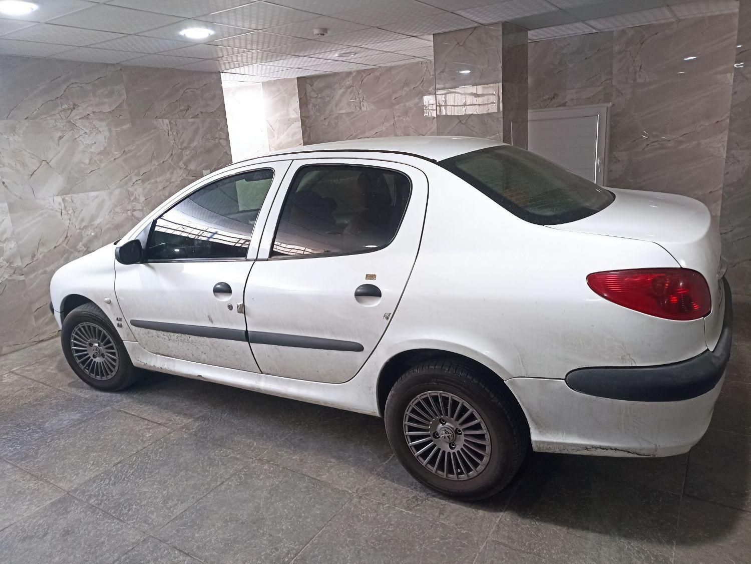 پژو ۲۰۶ صندوق دار v8 - 1396