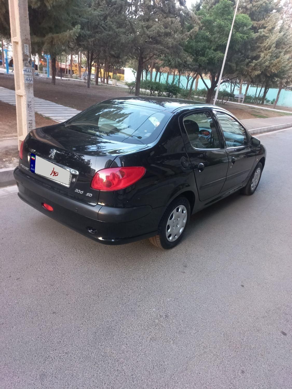 پژو ۲۰۶ صندوق دار v8 - 1395