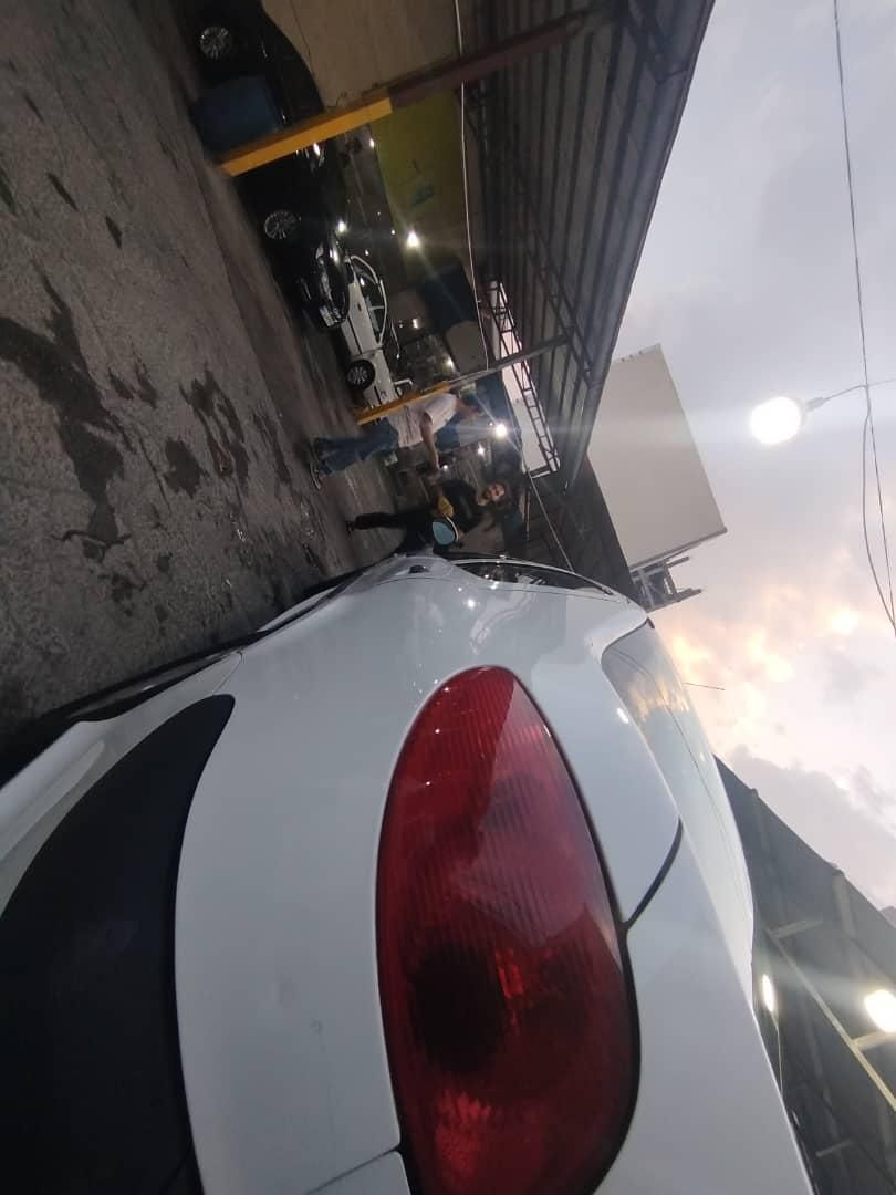 پژو ۲۰۶ صندوق دار v8 - 1396