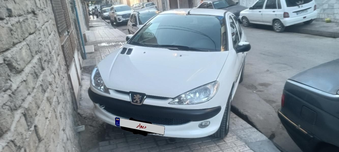 پژو ۲۰۶ صندوق دار v8 - 1391