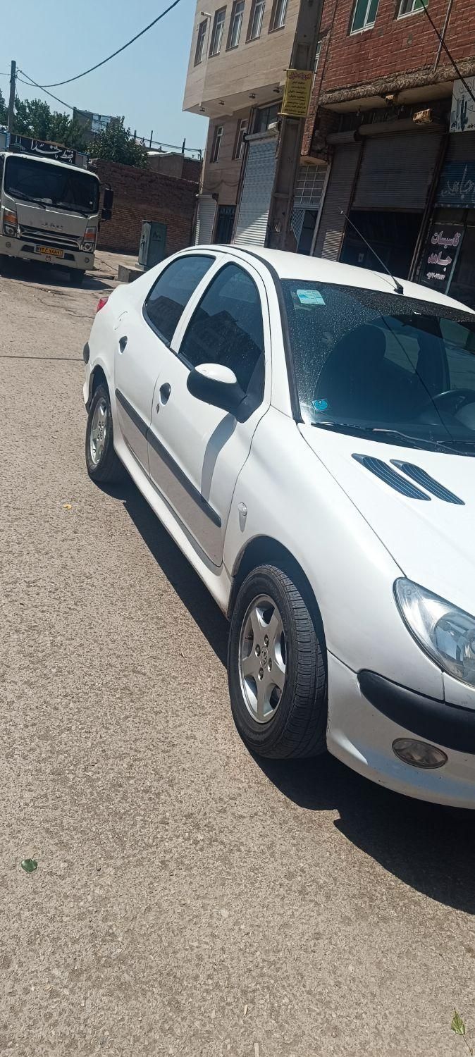 پژو ۲۰۶ صندوق دار v8 - 1393