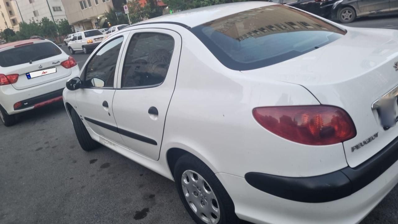 پژو ۲۰۶ صندوق دار v8 - 1398