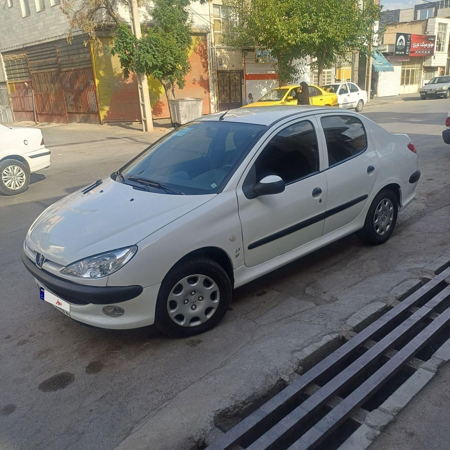 پژو ۲۰۶ صندوق دار v8 - 1394