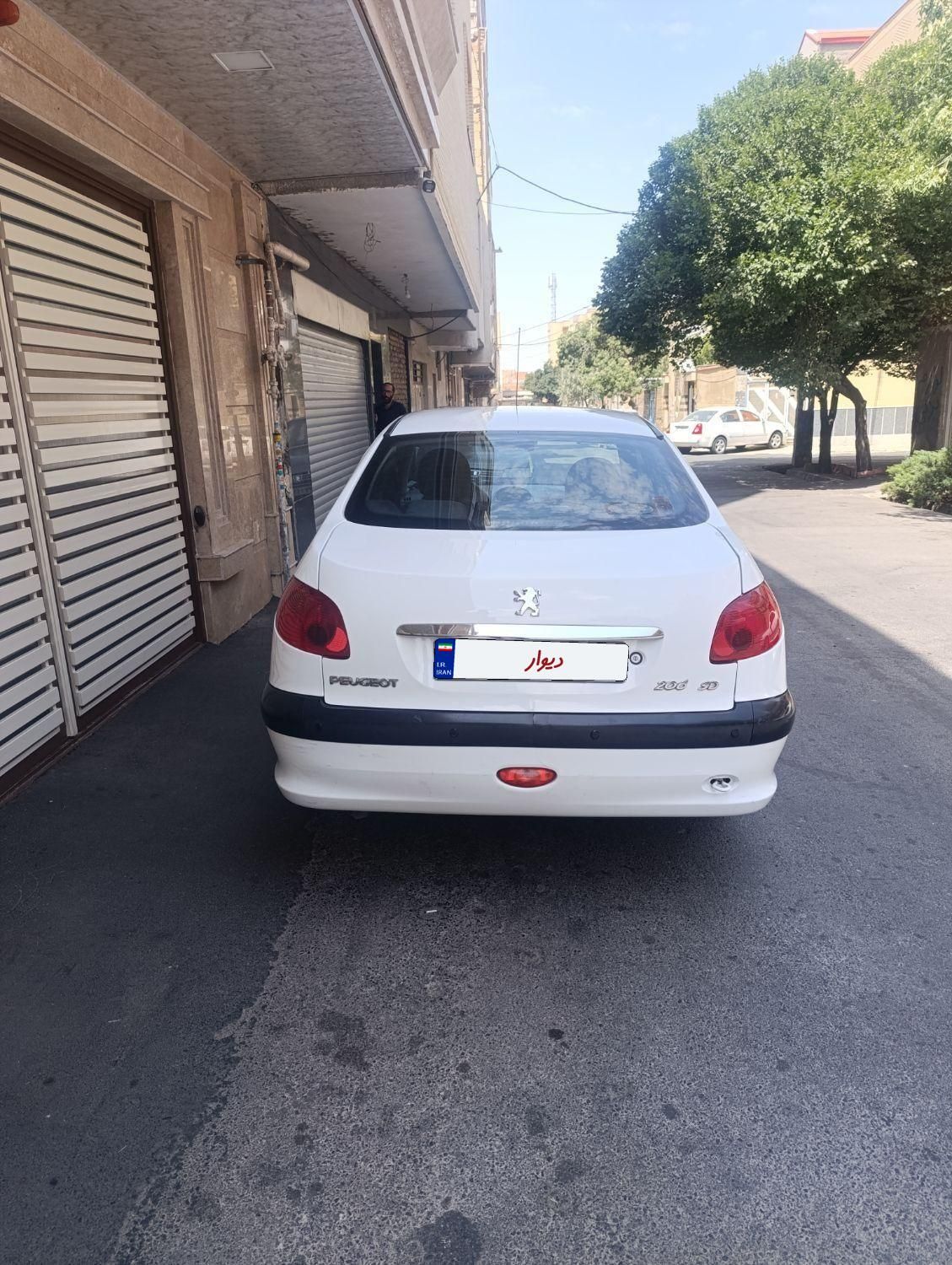 پژو ۲۰۶ صندوق دار v8 - 1391