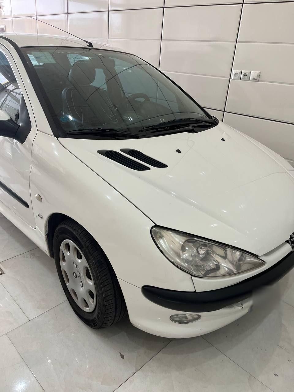 پژو ۲۰۶ صندوق دار v8 - 1396