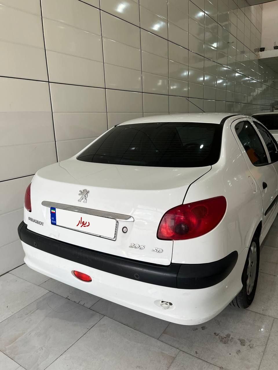 پژو ۲۰۶ صندوق دار v8 - 1396