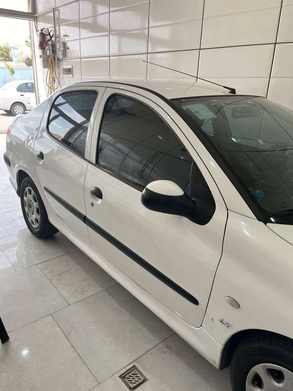 پژو ۲۰۶ صندوق دار v8 - 1396