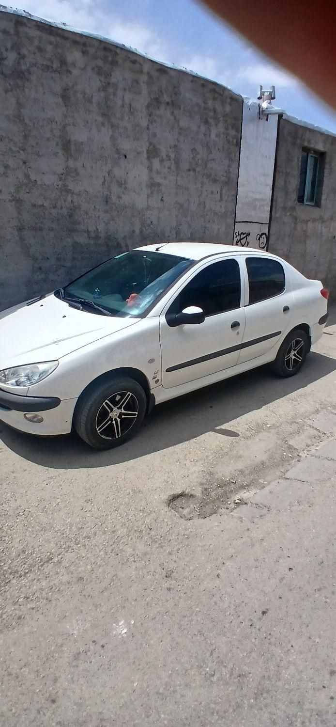 پژو ۲۰۶ صندوق دار v8 - 1396