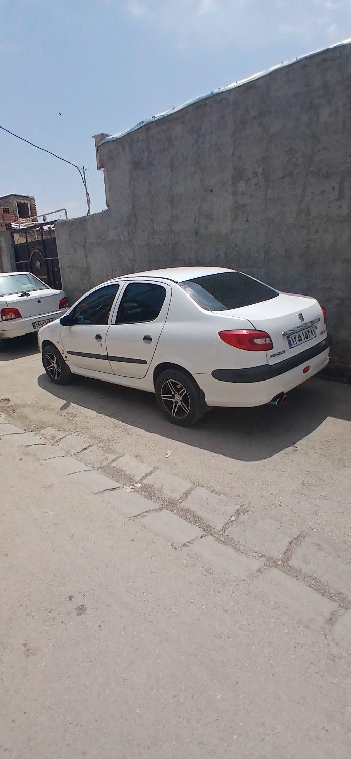 پژو ۲۰۶ صندوق دار v8 - 1396