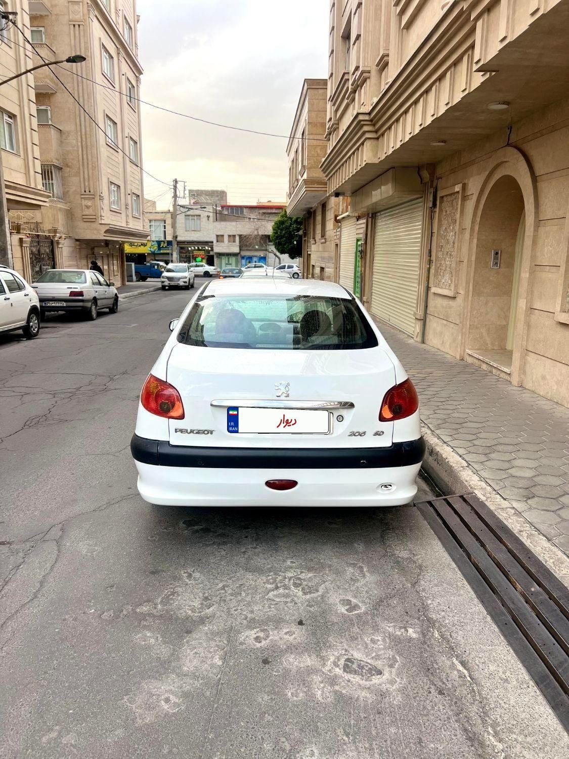 پژو ۲۰۶ صندوق دار v8 - 1396