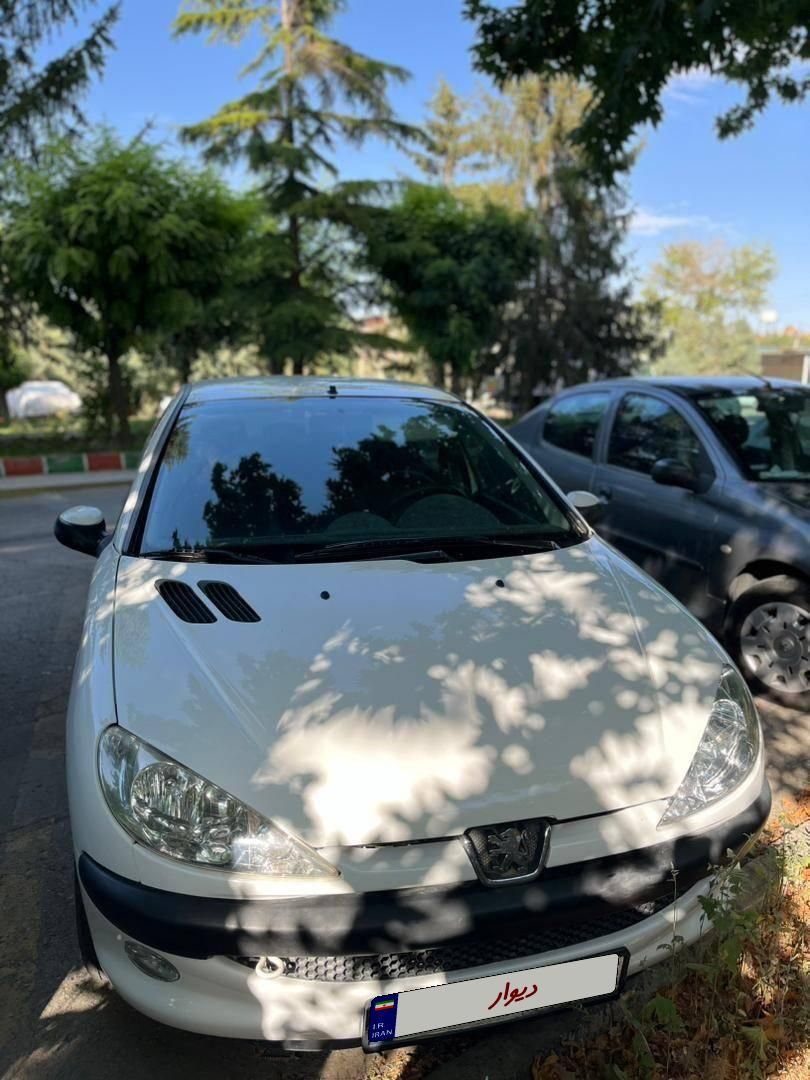 پژو ۲۰۶ صندوق دار v8 - 1396