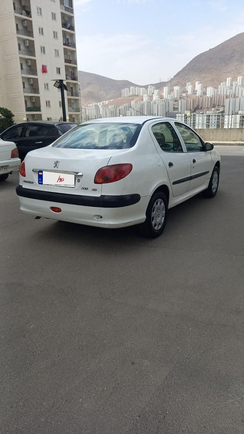پژو ۲۰۶ صندوق دار v8 - 1394