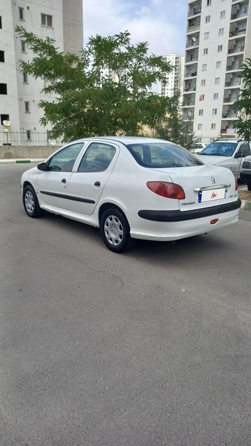 پژو ۲۰۶ صندوق دار v8 - 1394