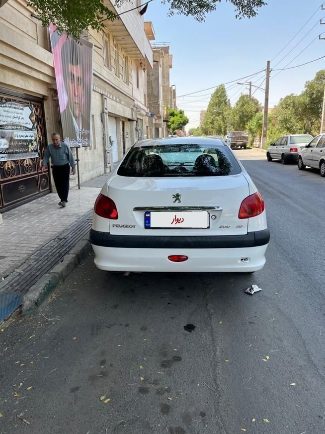 پژو ۲۰۶ صندوق دار v8 - 1397