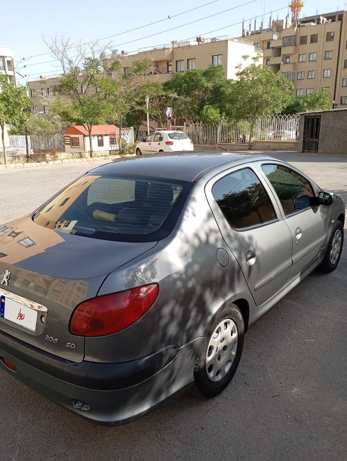 پژو ۲۰۶ صندوق دار v8 - 1393