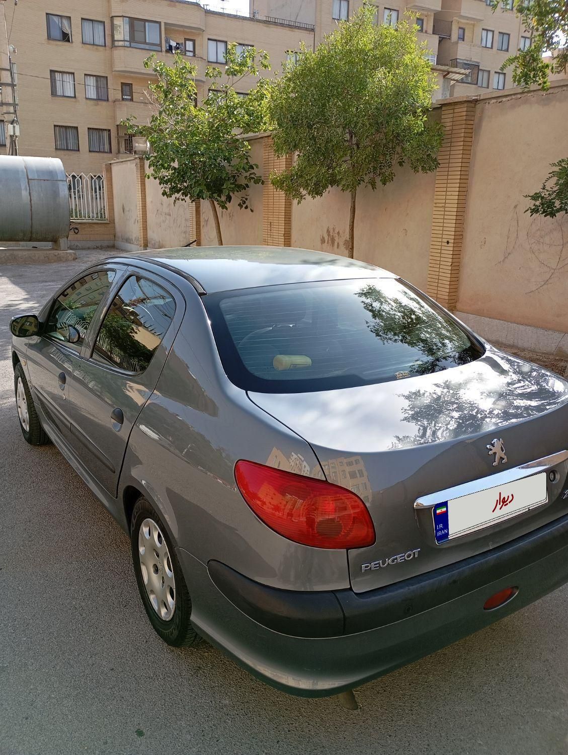 پژو ۲۰۶ صندوق دار v8 - 1393