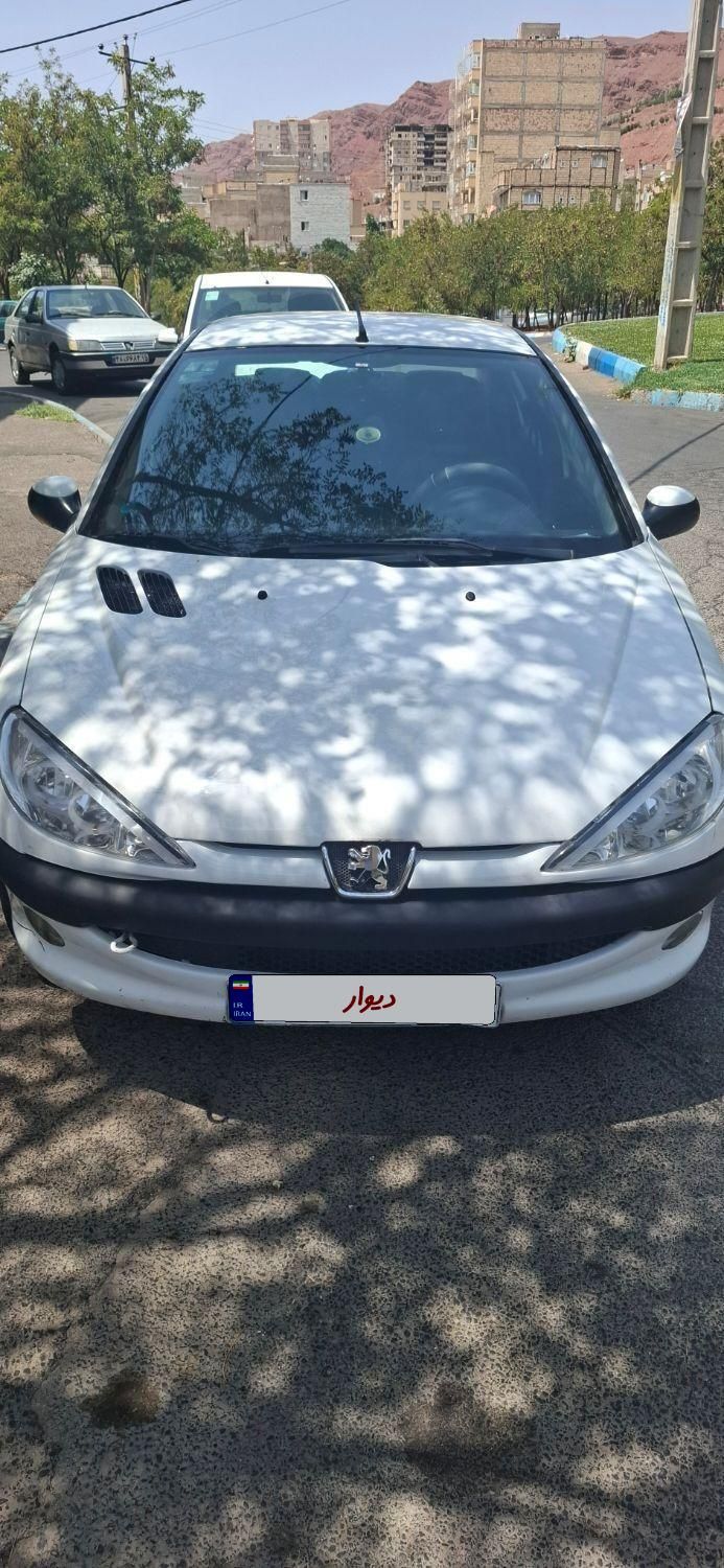 پژو ۲۰۶ صندوق دار v8 - 1395