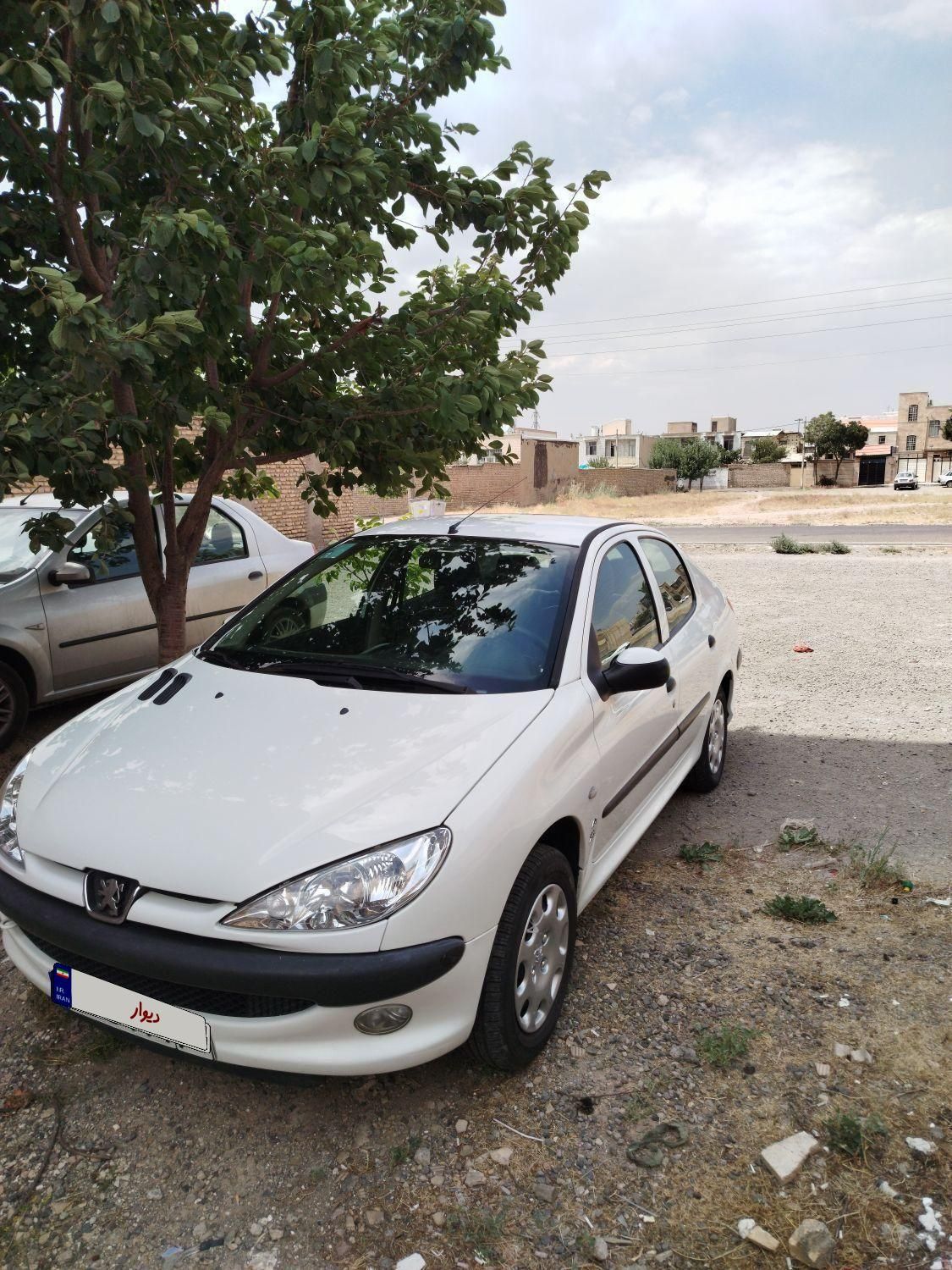 پژو ۲۰۶ صندوق دار v8 - 1394