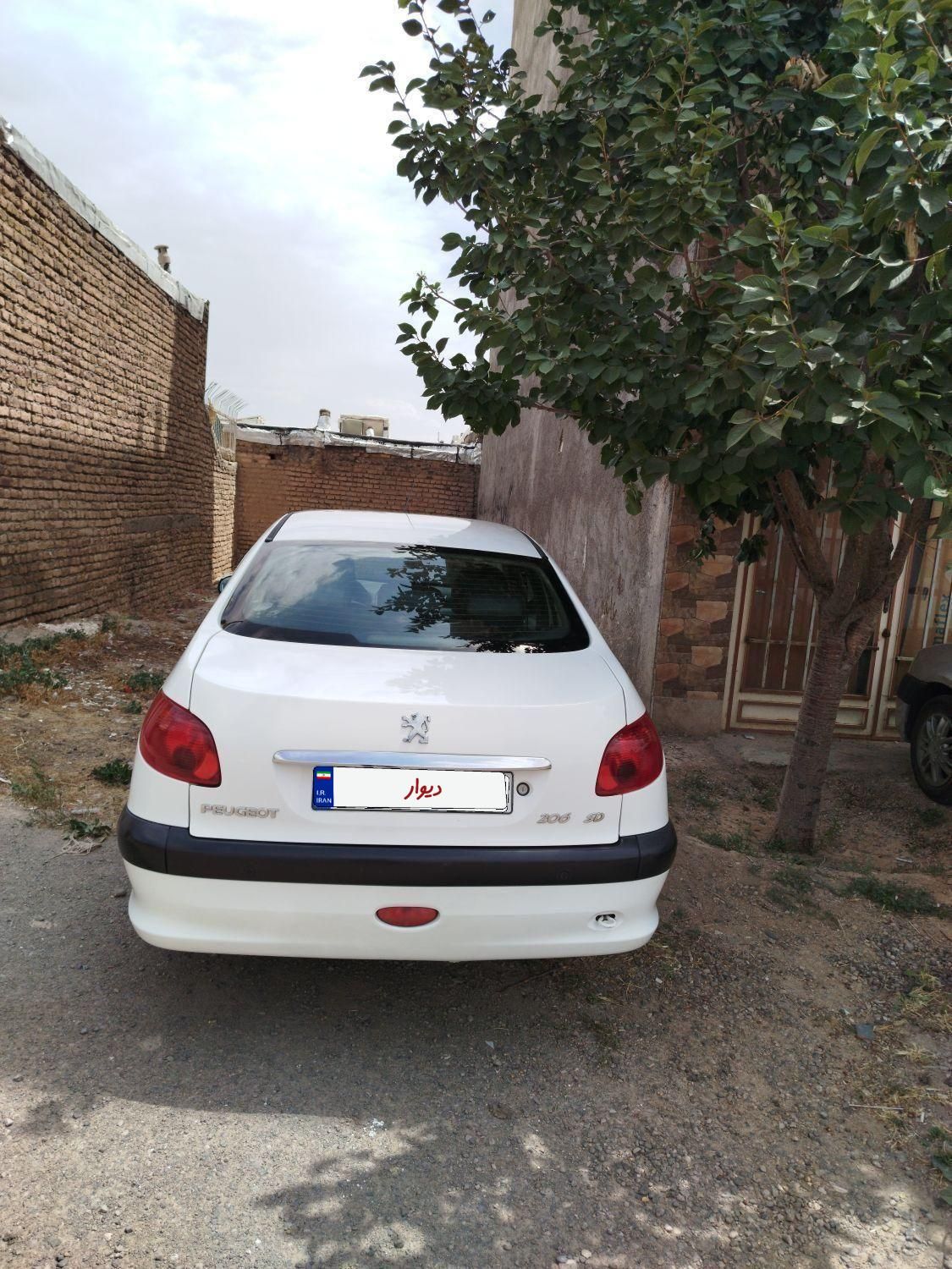 پژو ۲۰۶ صندوق دار v8 - 1394