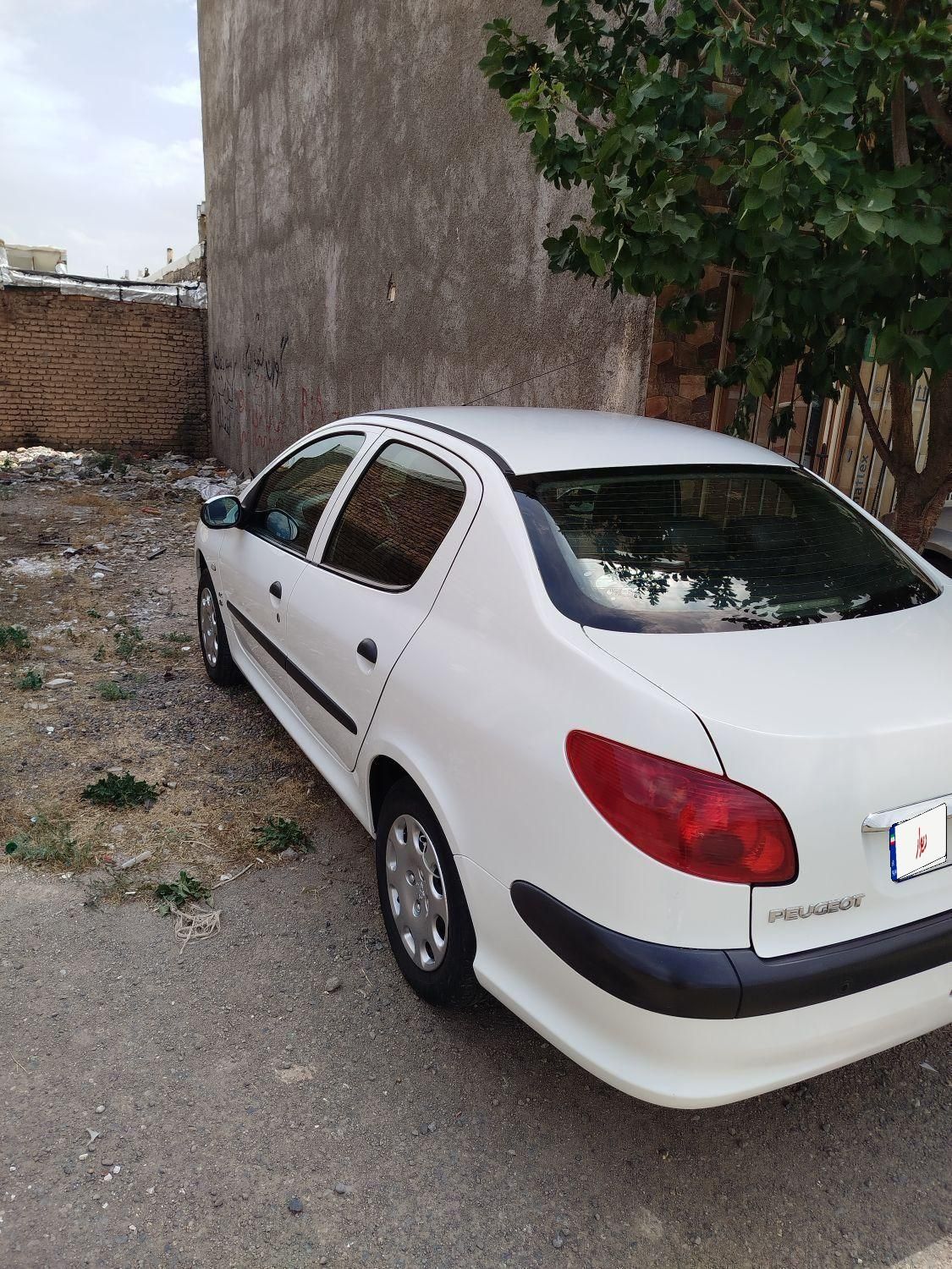 پژو ۲۰۶ صندوق دار v8 - 1394