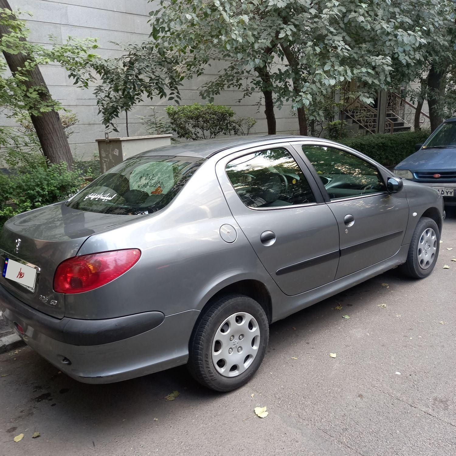 پژو ۲۰۶ صندوق دار v8 - 1390