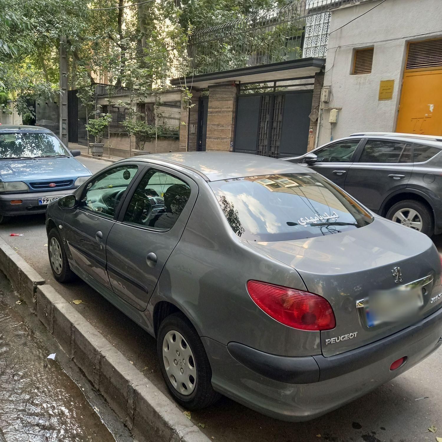 پژو ۲۰۶ صندوق دار v8 - 1390