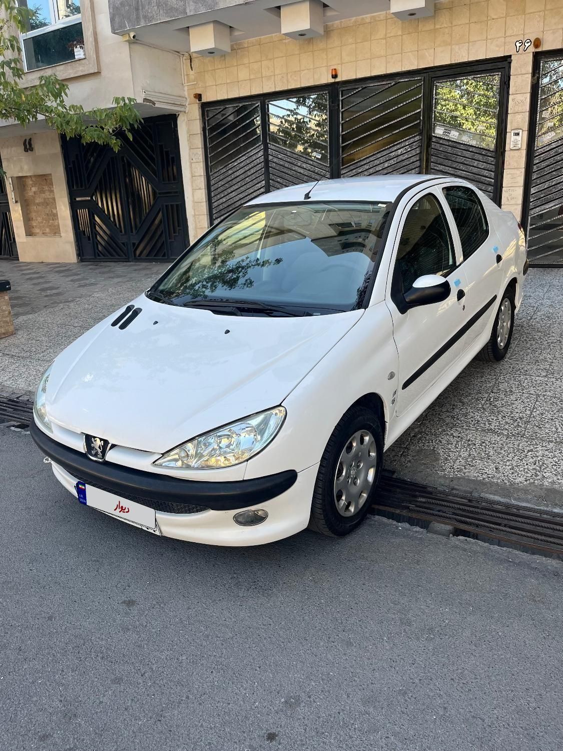 پژو ۲۰۶ صندوق دار v8 - 1395