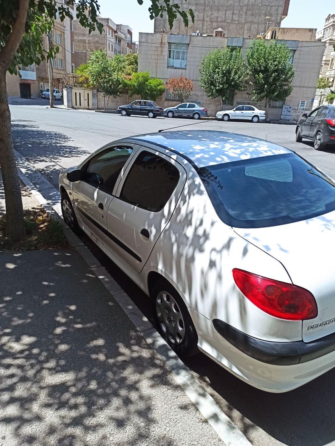 پژو ۲۰۶ صندوق دار v8 - 1399