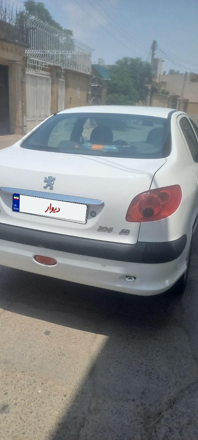 پژو ۲۰۶ صندوق دار v8 - 1395