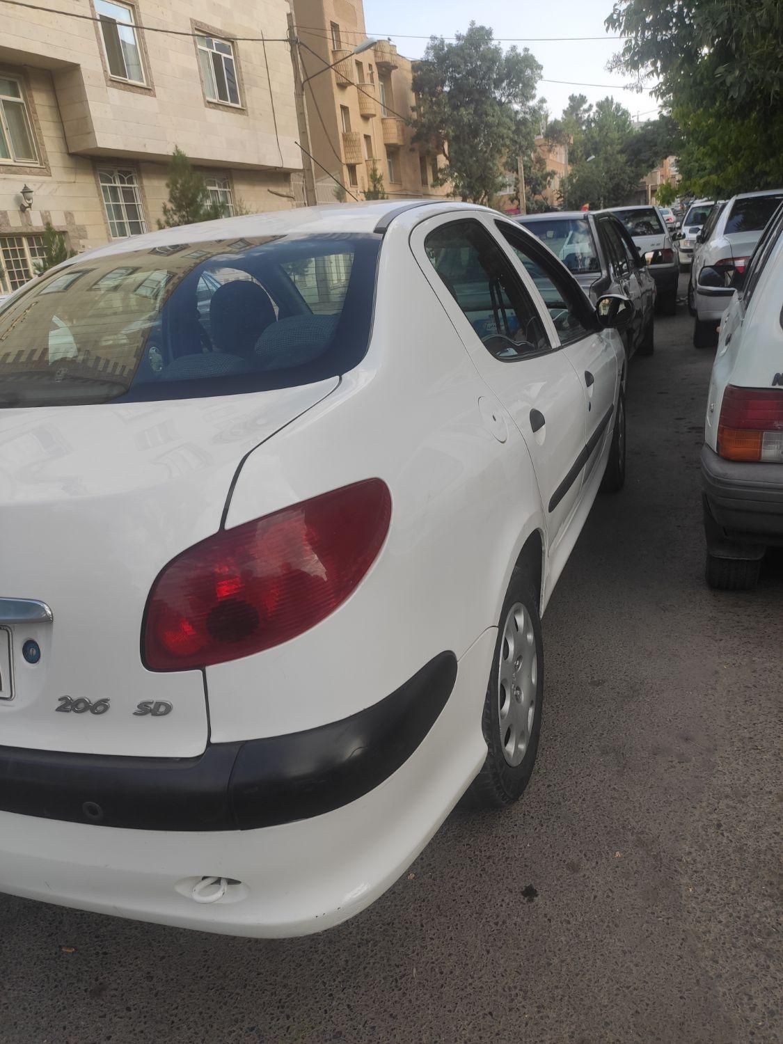 پژو ۲۰۶ صندوق دار v8 - 1396