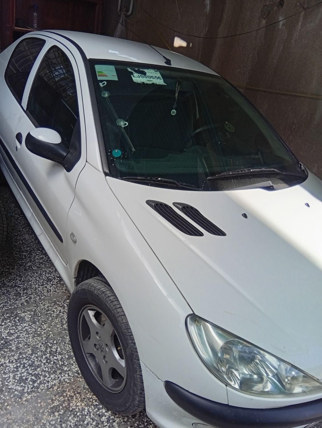 پژو ۲۰۶ صندوق دار v8 - 1399