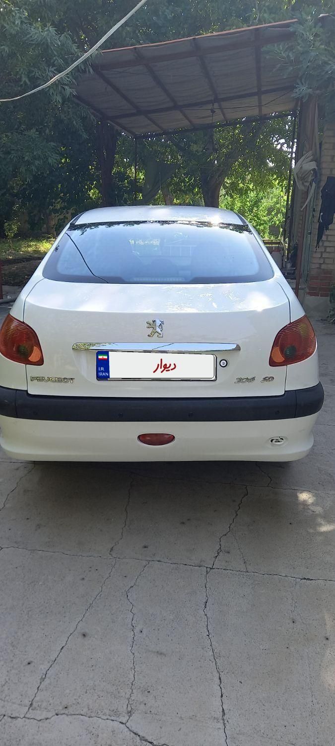پژو ۲۰۶ صندوق دار v8 - 1392