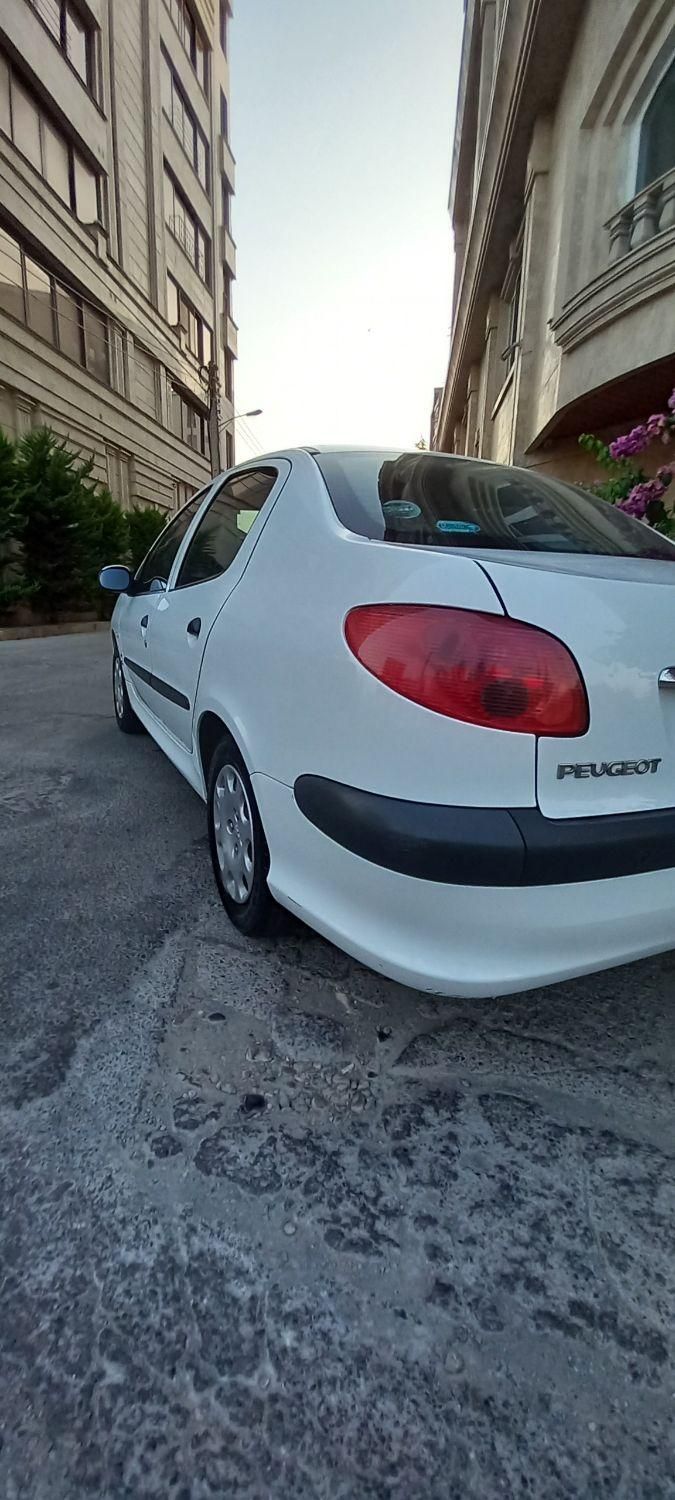 پژو ۲۰۶ صندوق دار v8 - 1396