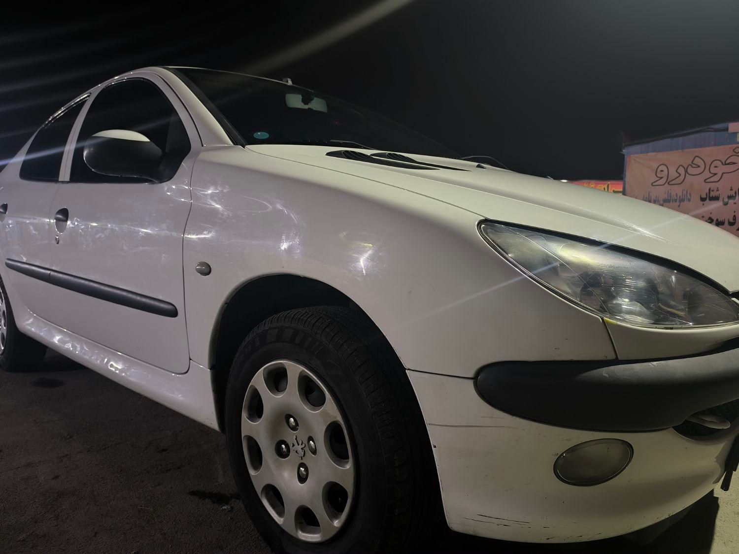 پژو ۲۰۶ صندوق دار v8 - 1396
