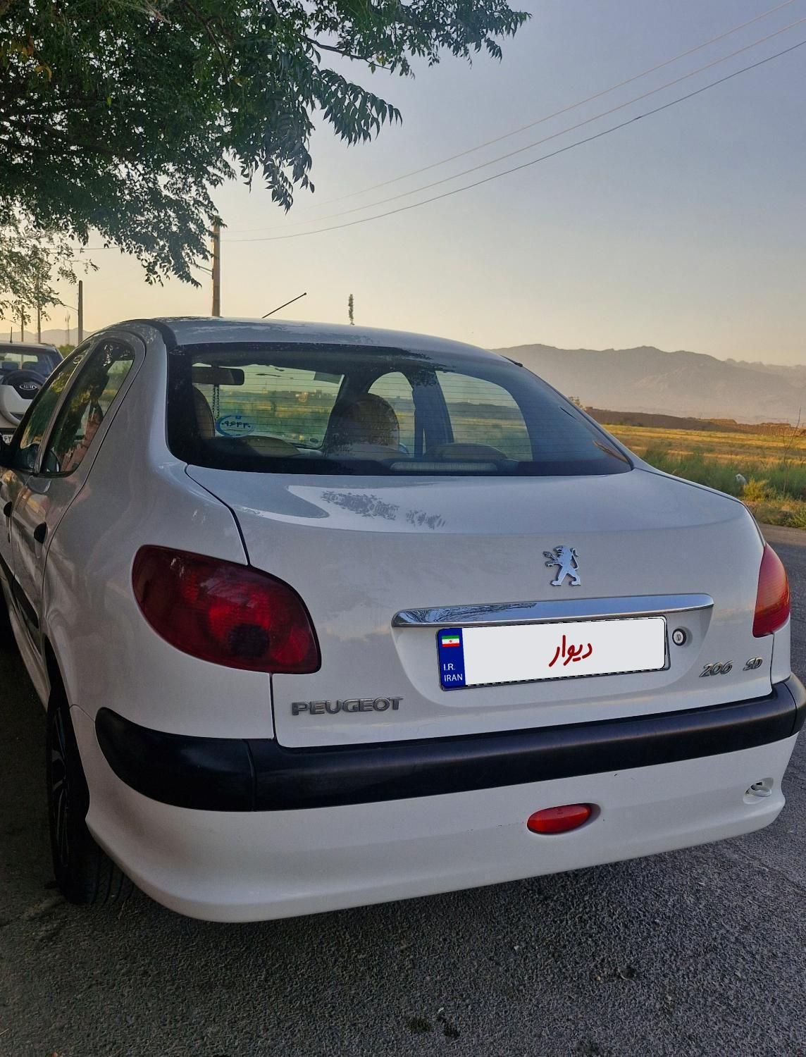 پژو ۲۰۶ صندوق دار v8 - 1399