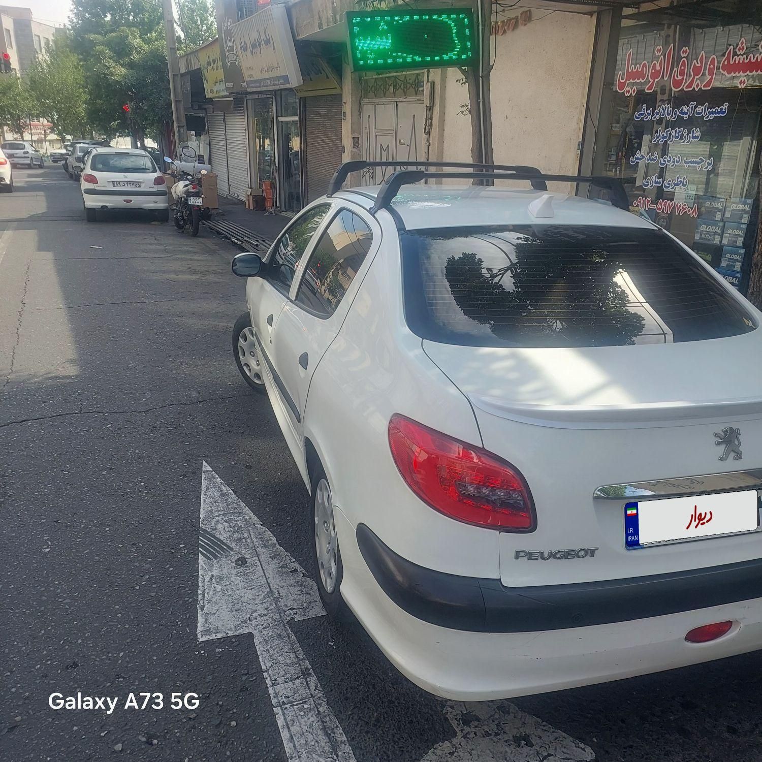 پژو ۲۰۶ صندوق دار v8 - 1396
