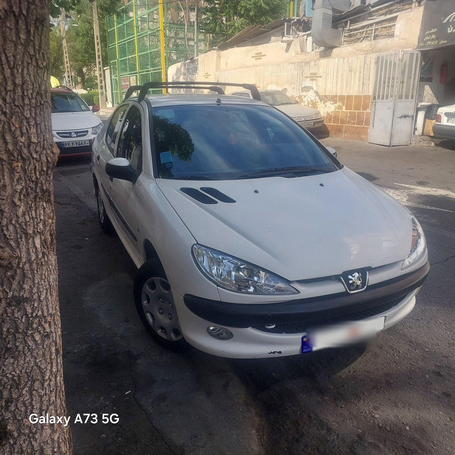 پژو ۲۰۶ صندوق دار v8 - 1396